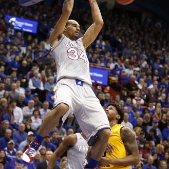Perry Ellis slams down a dunk in Kansas' 78-62 win over Kent State.