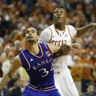 Perry Ellis attempts to block out Myles Turner in Kansas' 75-62 win over Texas.