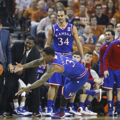 Jamari Traylor goes diving out of bounds for a ball in Kansas' 75-62 win over Texas.