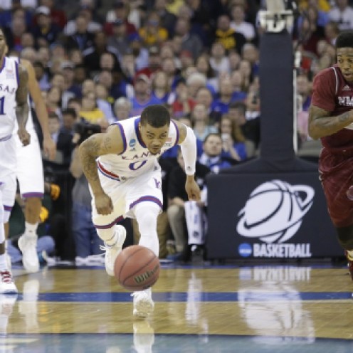 Frank Mason hustles for a loose ball in Kansas' 75-56 win over New Mexico State.
